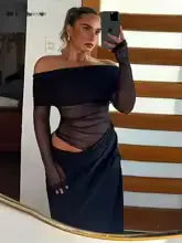 Hoochie Couture Mesh Ruched Maxi Dress – elegant and sexy women’s dress featuring sheer mesh fabric, flattering ruched detailing, and a curve-hugging maxi silhouette, perfect for evening parties, date nights, or upscale clubwear fashion.