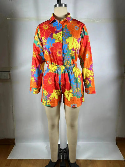 Hoochie Couture Floral Print 2-Piece Set – women’s summer outfit with long sleeve button-up shirt and fitted shorts, lightweight and breathable for vacation, brunch, or festival fashion.