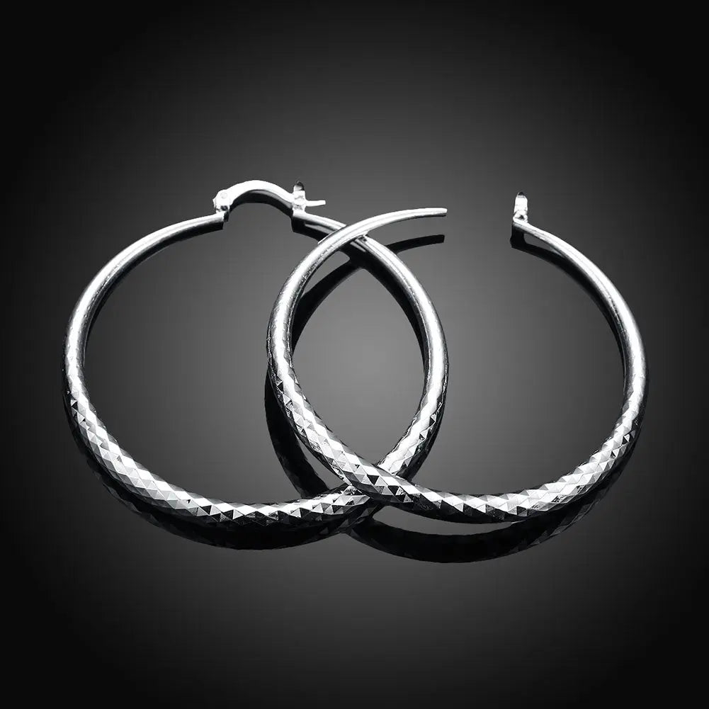 Hoochie Couture 925 Sterling Silver Hoop Earrings – Timeless Elegance with a Bold Twist Hoochie Couture Boutique