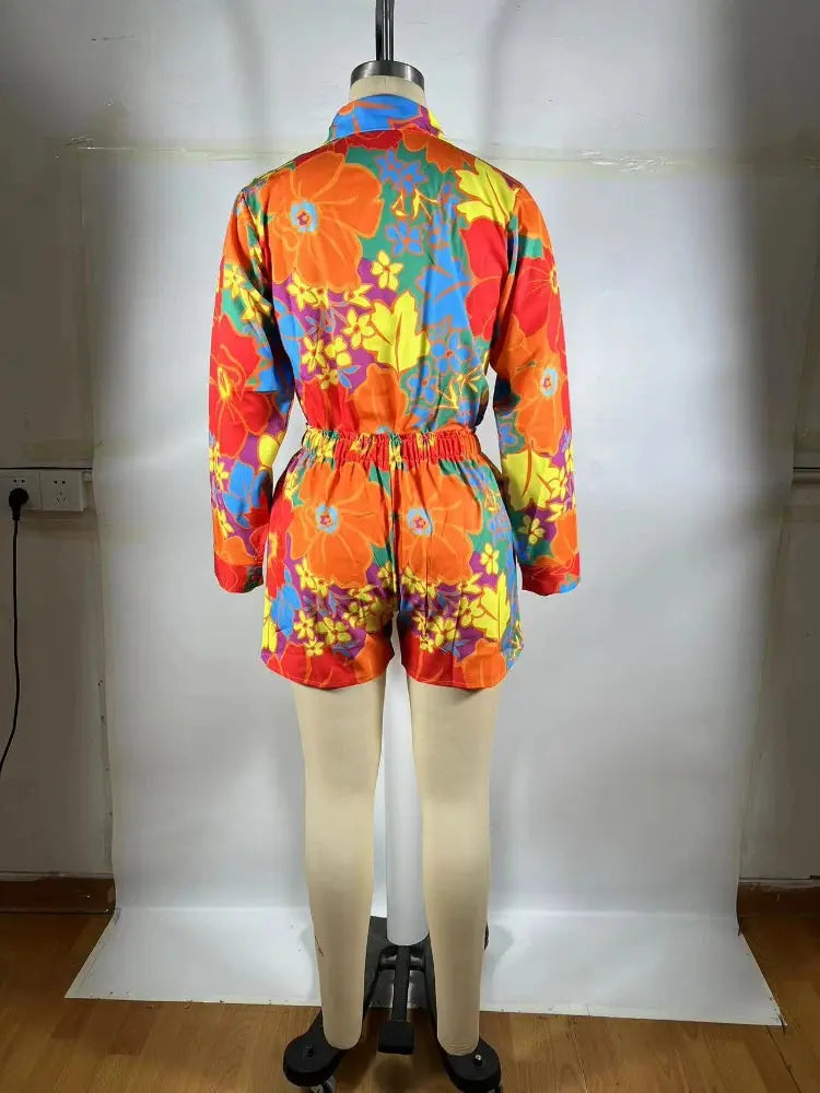 Hoochie Couture Floral Print 2-Piece Set – women’s summer outfit with long sleeve button-up shirt and fitted shorts, lightweight and breathable for vacation, brunch, or festival fashion.
