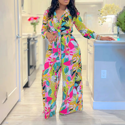 Hoochie Couture Printed Two-Piece Set – stylish women’s matching outfit with bold all-over print, featuring a crop top and high-waisted shorts or pants, perfect for summer streetwear, vacation, or festival fashion.