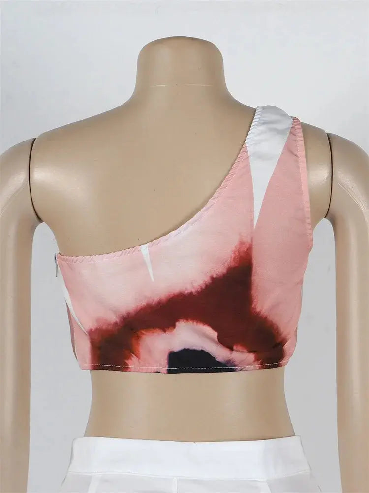 Hoochie Couture Floral Two-Piece Set – chic women’s co-ord with vibrant floral print, featuring a cropped top and matching high-waisted shorts or skirt, perfect for summer, brunch, or vacation wear