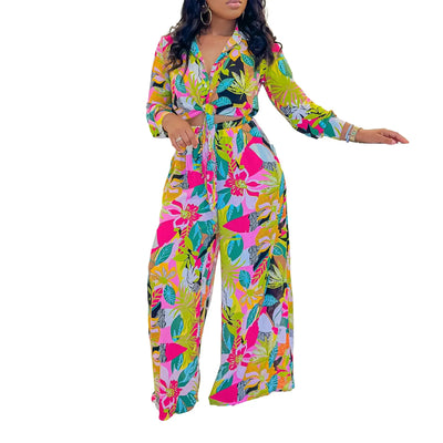 Hoochie Couture Printed Two-Piece Set – stylish women’s matching outfit with bold all-over print, featuring a crop top and high-waisted shorts or pants, perfect for summer streetwear, vacation, or festival fashion.
