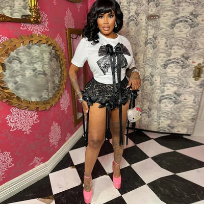 Hoochie Couture Lace Crop Top & Pant Set – elegant and edgy women’s two-piece outfit featuring a delicate lace crop top and matching high-waisted pants, perfect for date nights, fashion-forward events, or elevated street style.