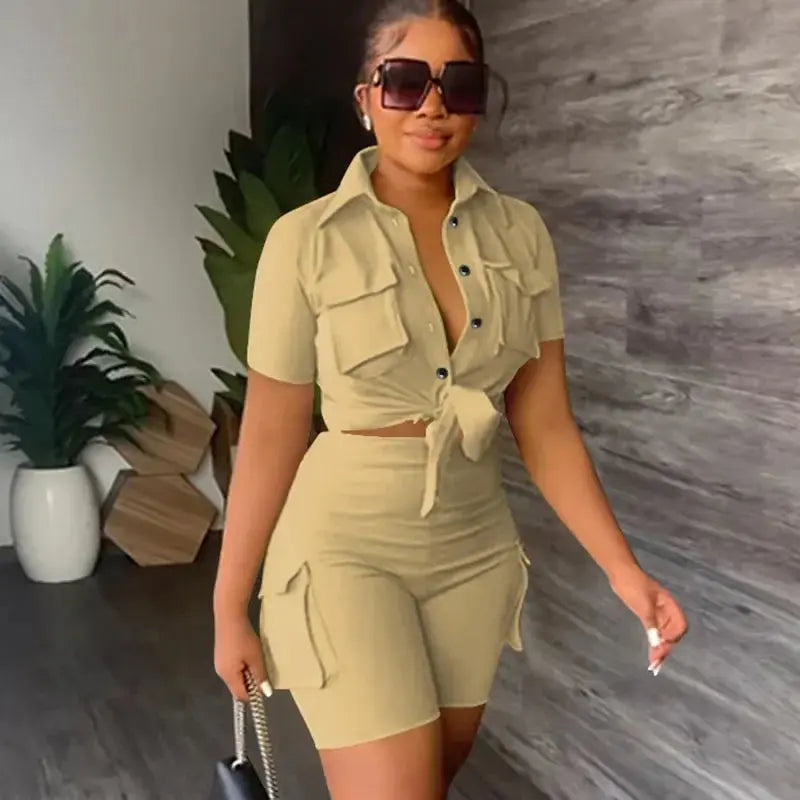 Hoochie Couture Streetwear Two-Piece Set – bold women’s matching outfit featuring an oversized graphic top and coordinating shorts or pants, perfect for edgy street style, casual wear, or festival fashion