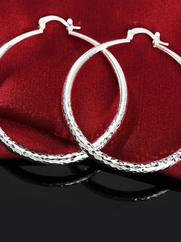 Hoochie Couture 925 Sterling Silver Hoop Earrings – Timeless Elegance with a Bold Twist Hoochie Couture Boutique