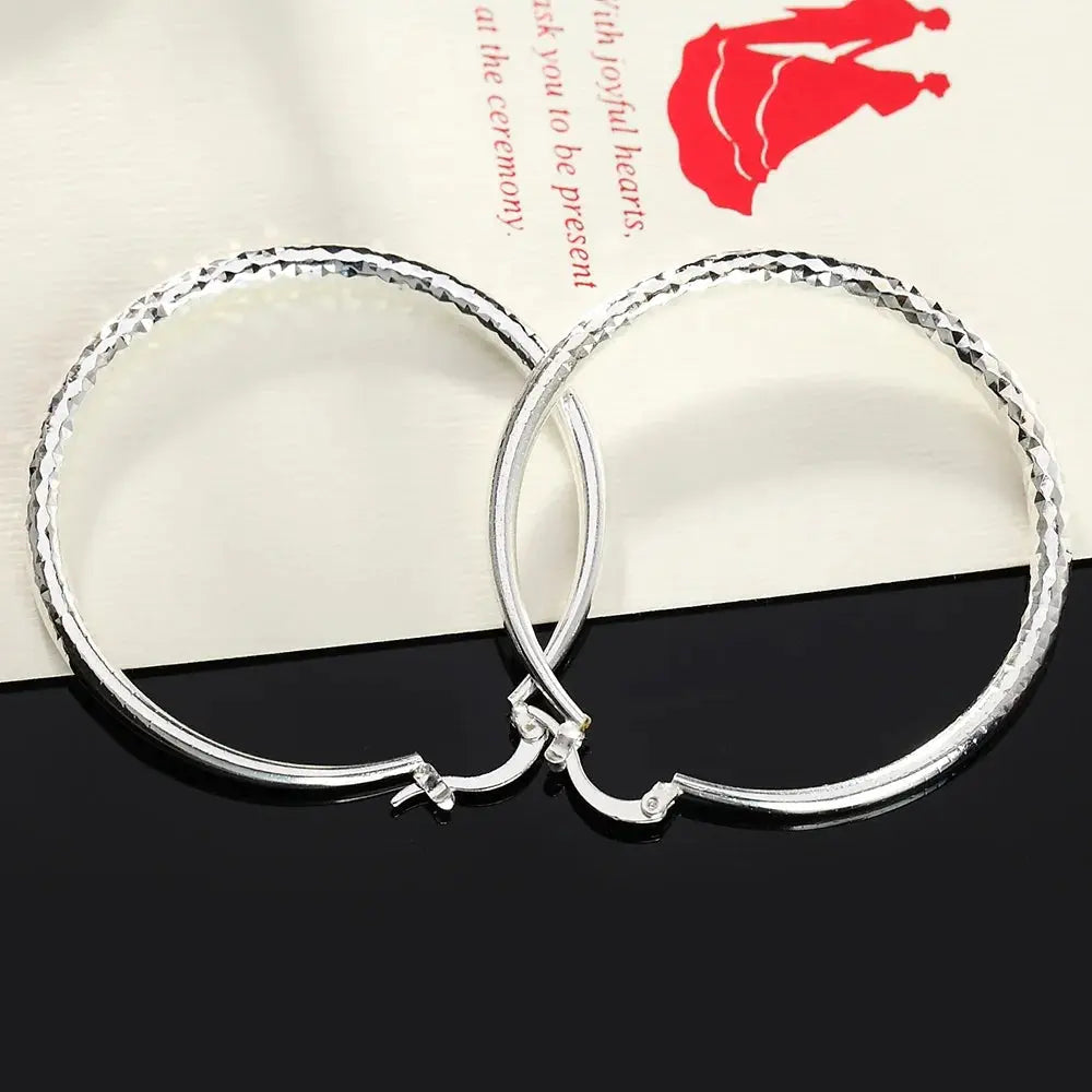 Hoochie Couture 925 Sterling Silver Hoop Earrings – Timeless Elegance with a Bold Twist Hoochie Couture Boutique