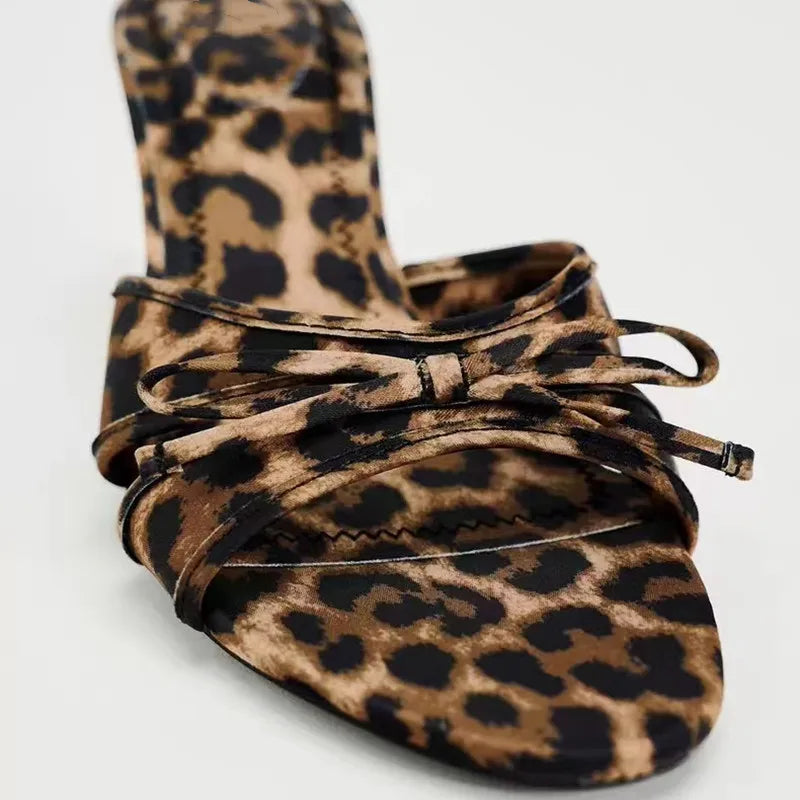 Hoochie Couture Leopard Print Bow Slippers – Fierce, Flirty & Fashion-Forward