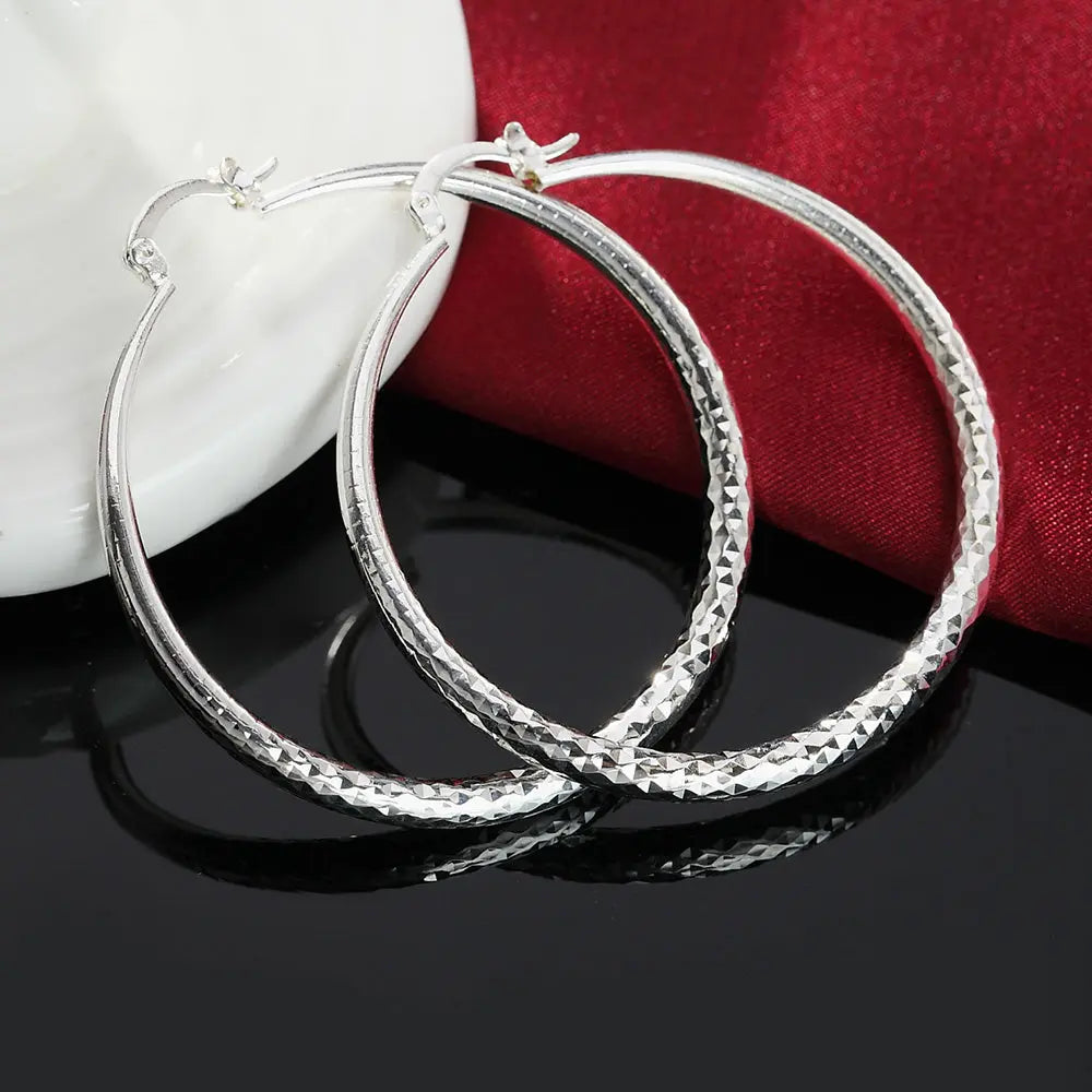 Hoochie Couture 925 Sterling Silver Hoop Earrings – Timeless Elegance with a Bold Twist Hoochie Couture Boutique