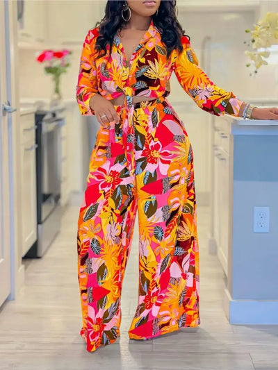 Hoochie Couture Printed Two-Piece Set – stylish women’s matching outfit with bold all-over print, featuring a crop top and high-waisted shorts or pants, perfect for summer streetwear, vacation, or festival fashion.