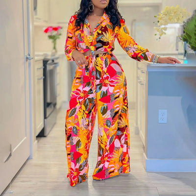 Hoochie Couture Printed Two-Piece Set – stylish women’s matching outfit with bold all-over print, featuring a crop top and high-waisted shorts or pants, perfect for summer streetwear, vacation, or festival fashion.
