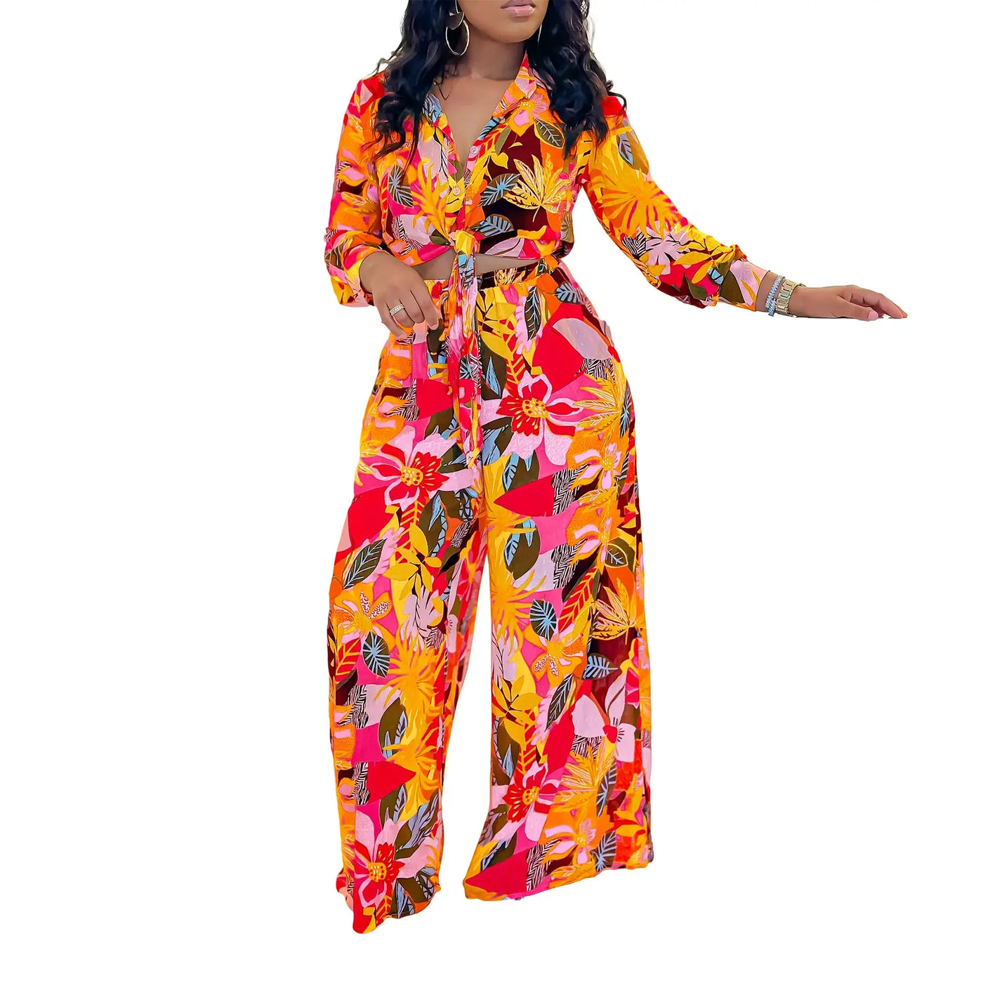 Hoochie Couture Printed Two-Piece Set – stylish women’s matching outfit with bold all-over print, featuring a crop top and high-waisted shorts or pants, perfect for summer streetwear, vacation, or festival fashion.