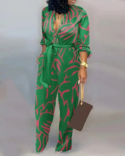 Women's stylish printed belted jumpsuit with V-neck, long sleeves, and button-up front – Hoochie Couture one-piece outfit