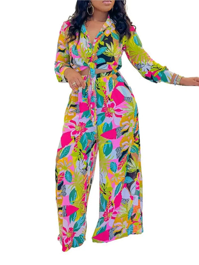 Hoochie Couture Printed Two-Piece Set – stylish women’s matching outfit with bold all-over print, featuring a crop top and high-waisted shorts or pants, perfect for summer streetwear, vacation, or festival fashion.