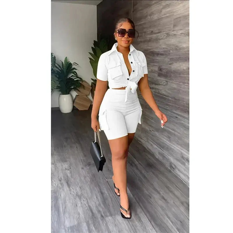 Hoochie Couture Streetwear Two-Piece Set – bold women’s matching outfit featuring an oversized graphic top and coordinating shorts or pants, perfect for edgy street style, casual wear, or festival fashion