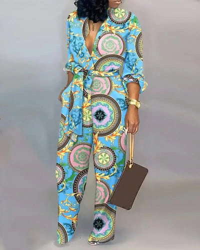Women's stylish printed belted jumpsuit with V-neck, long sleeves, and button-up front – Hoochie Couture one-piece outfit