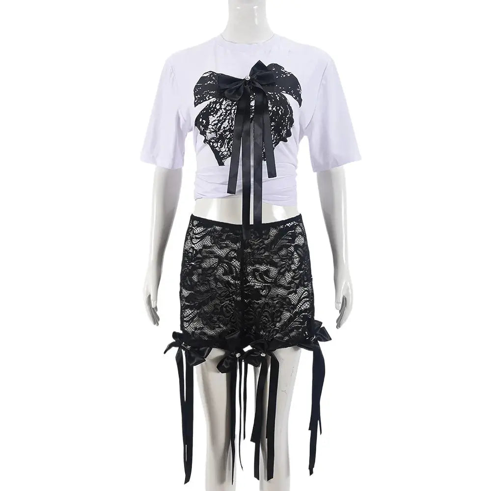 Hoochie Couture Lace Crop Top & Pant Set – elegant and edgy women’s two-piece outfit featuring a delicate lace crop top and matching high-waisted pants, perfect for date nights, fashion-forward events, or elevated street style.