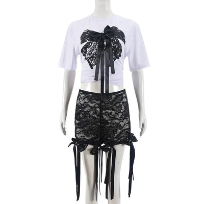 Hoochie Couture Lace Crop Top & Pant Set – elegant and edgy women’s two-piece outfit featuring a delicate lace crop top and matching high-waisted pants, perfect for date nights, fashion-forward events, or elevated street style.