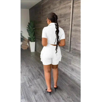 Hoochie Couture Streetwear Two-Piece Set – bold women’s matching outfit featuring an oversized graphic top and coordinating shorts or pants, perfect for edgy street style, casual wear, or festival fashion
