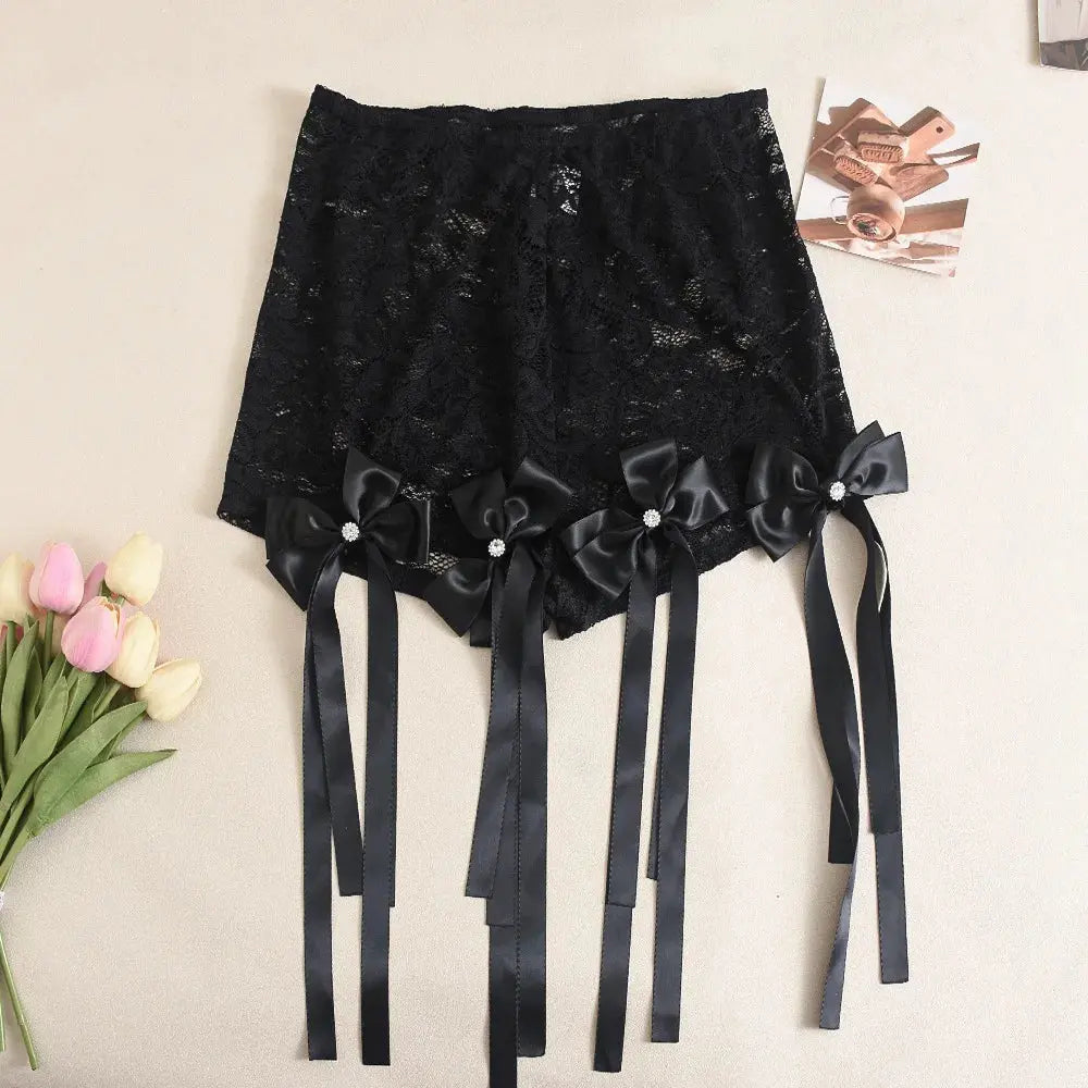Hoochie Couture Lace Crop Top & Pant Set – elegant and edgy women’s two-piece outfit featuring a delicate lace crop top and matching high-waisted pants, perfect for date nights, fashion-forward events, or elevated street style.