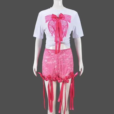 Hoochie Couture Lace Crop Top & Pant Set – elegant and edgy women’s two-piece outfit featuring a delicate lace crop top and matching high-waisted pants, perfect for date nights, fashion-forward events, or elevated street style.
