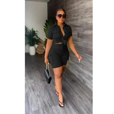 Hoochie Couture Streetwear Two-Piece Set – bold women’s matching outfit featuring an oversized graphic top and coordinating shorts or pants, perfect for edgy street style, casual wear, or festival fashion