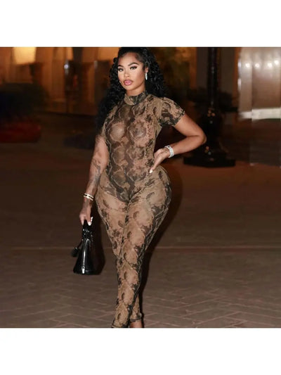 Hoochie Couture Snake Print Backless See-Through Jumpsuit – Sultry, Bold & Unapologetically Wild
