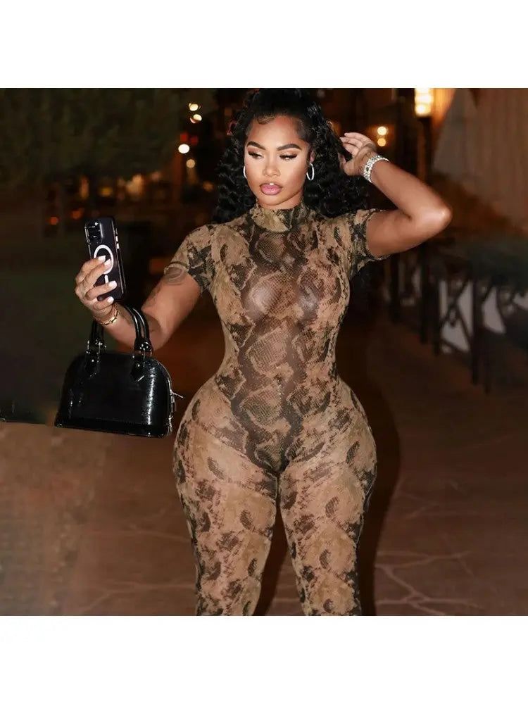 Hoochie Couture Snake Print Backless See-Through Jumpsuit – Sultry, Bold & Unapologetically Wild