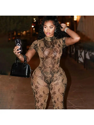 Hoochie Couture Snake Print Backless See-Through Jumpsuit – Sultry, Bold & Unapologetically Wild