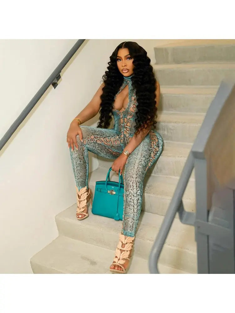 Hoochie Couture Snake Print Hollow Front Jumpsuit – Sultry, Bold & Curve-Hugging