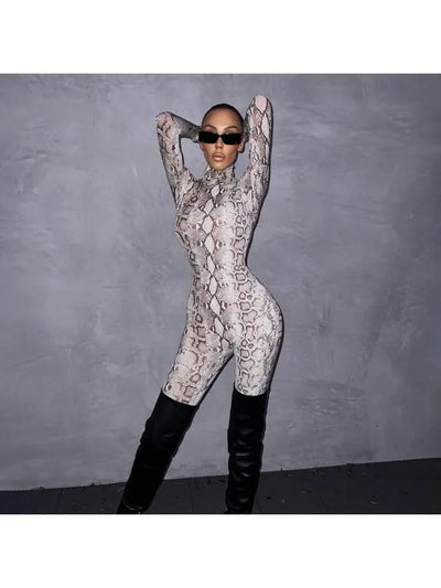 Hoochie Couture Snakeskin Printed Mock Neck Jumpsuit – Sleek, Bold & Bodycon Perfection