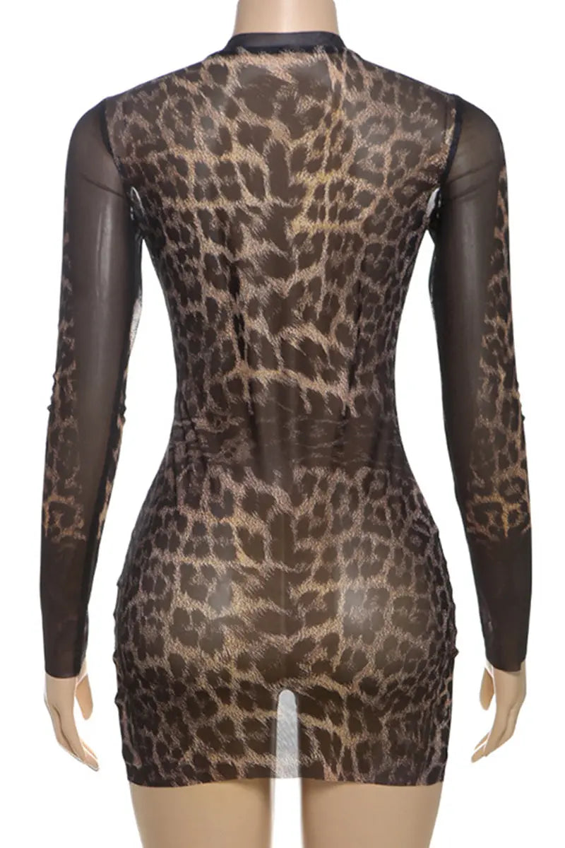 Hoochie Couture Leopard Mesh Wrap Dress – sheer and sultry women’s dress featuring a bold leopard print, wrap silhouette, and lightweight mesh fabric, perfect for night-out, beach cover-up, or resort wear