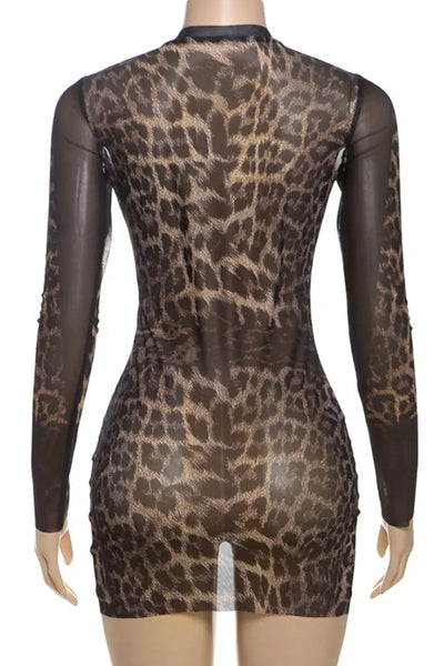 Hoochie Couture Leopard Mesh Wrap Dress – sheer and sultry women’s dress featuring a bold leopard print, wrap silhouette, and lightweight mesh fabric, perfect for night-out, beach cover-up, or resort wear
