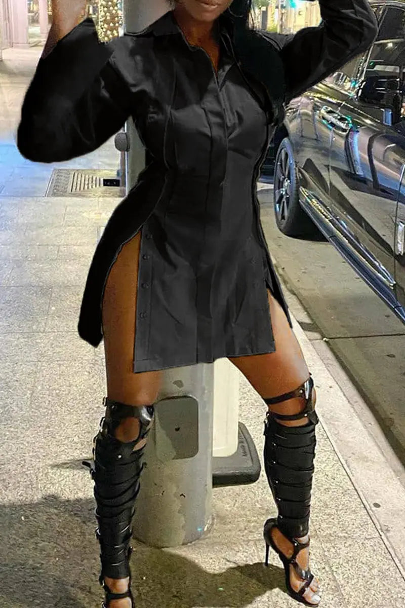 Hoochie Couture Buckle Slit Shirt Dress – edgy and structured women’s shirt dress featuring a front buckle detail, thigh-high slit, and tailored silhouette, perfect for street style, night-out looks, or fashion-forward daywear.