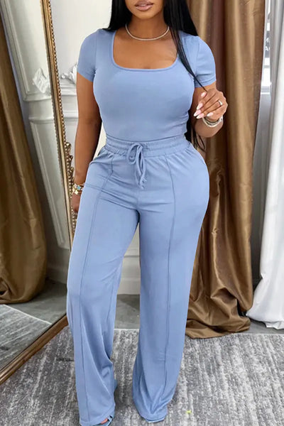 Hoochie Couture Square Neck Two-Piece Set – chic women’s co-ord outfit featuring a cropped square-neck top and matching high-waisted bottoms, perfect for summer street style, brunch looks, or casual glam wear.