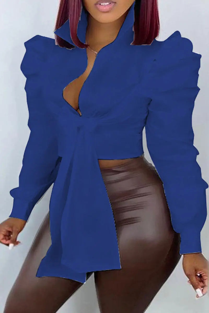 Hoochie Couture Bandage Wrap Top – sexy and structured women’s crop top featuring a bandage-style wrap design, deep V-neckline, and adjustable tie closure, perfect for night-out looks, clubwear, or bold street style outfits.