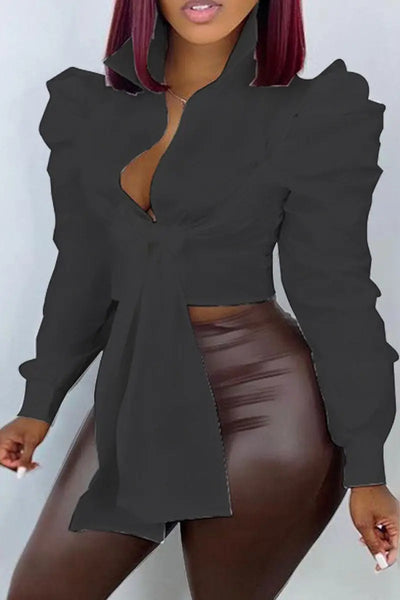 Hoochie Couture Bandage Wrap Top – sexy and structured women’s crop top featuring a bandage-style wrap design, deep V-neckline, and adjustable tie closure, perfect for night-out looks, clubwear, or bold street style outfits.
