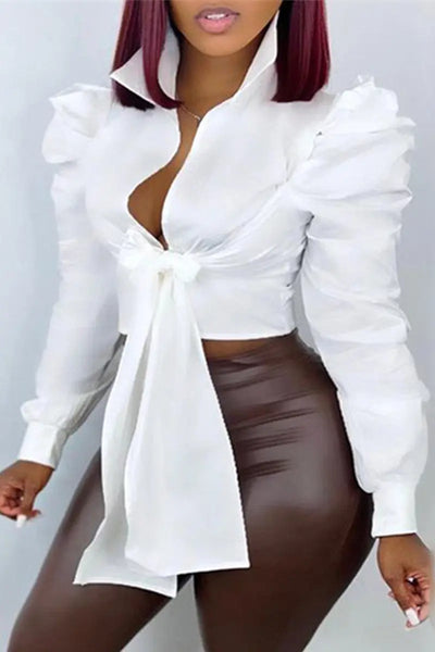 Hoochie Couture Bandage Wrap Top – sexy and structured women’s crop top featuring a bandage-style wrap design, deep V-neckline, and adjustable tie closure, perfect for night-out looks, clubwear, or bold street style outfits.