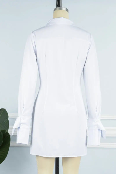 Hoochie Couture Patchwork Shirt Dress – trendy women’s shirt dress featuring bold colorblock patchwork, button-down front, and relaxed fit, perfect for streetwear, casual day outfits, or edgy layered looks.