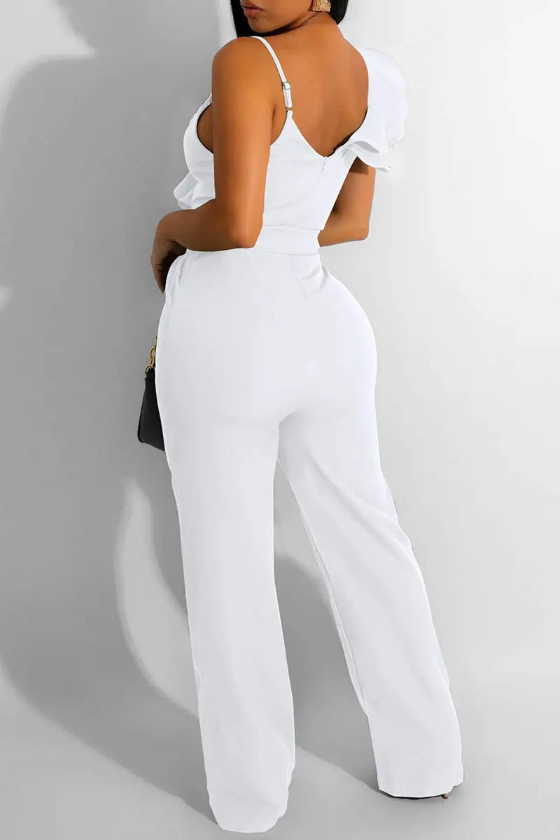 Hoochie Couture V-Neck Patchwork Jumpsuit – edgy and figure-flattering women’s one-piece featuring a deep V-neckline, bold colorblock patchwork design, and bodycon fit, perfect for street style, nightlife, or fashion-forward daywear.